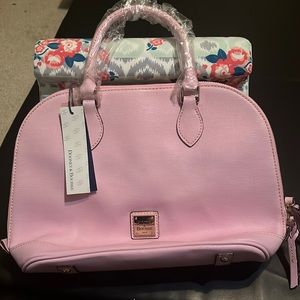 A pink Dooney & Bourke purse. Like the last one , was a gift to me also!